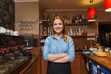 Image showing happy barista woman at coffee shop