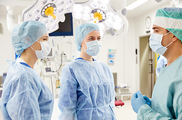 Image showing group of surgeons in operating room at hospital