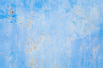 Image showing Old blue cracked paint on metal background