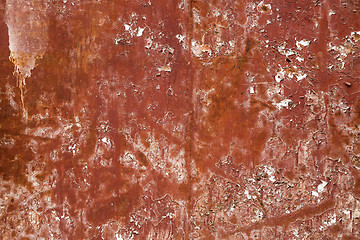 Image showing Old red cracked paint on metal background