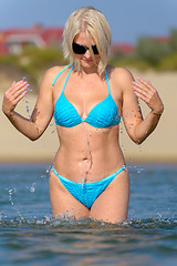 Image showing Woman in a blue bikini