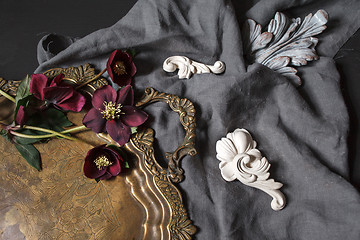 Image showing Ancient copper tray and flowers