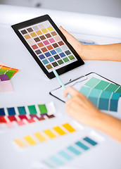 Image showing woman working with color samples for selection