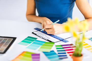 Image showing woman working with color samples for selection