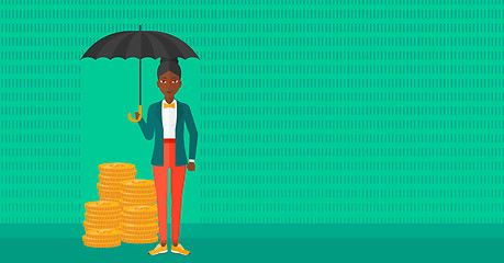 Image showing Woman with umbrella protecting money.