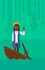 Image showing Business woman standing in sinking boat.