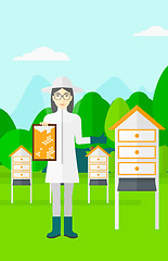 Image showing Bee-keeper at apiary.