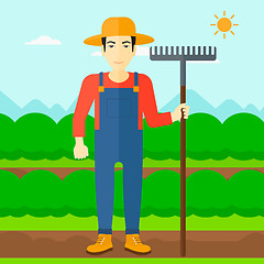 Image showing Farmer with rake.