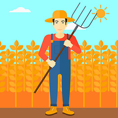 Image showing Farmer with pitchfork.