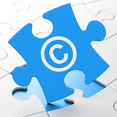 Image showing Law concept: Copyright on puzzle background