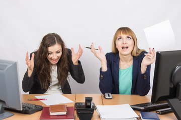 Image showing Two employee in the office and express rabost relief