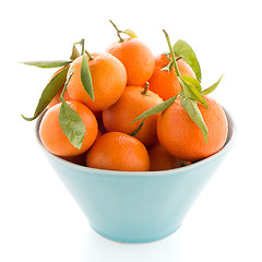 Image showing Tangerines on ceramic blue bowl 