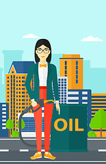 Image showing Woman with oil can and filling nozzle.