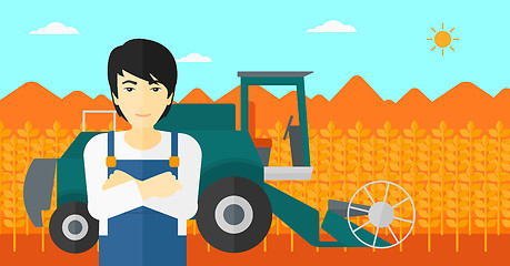 Image showing Man standing with combine on background.