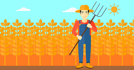 Image showing Farmer with pitchfork.