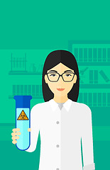 Image showing Laboratory assistant with test tube.