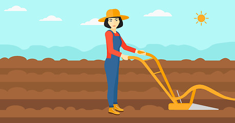 Image showing Farmer on the field with plough.