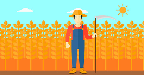 Image showing Farmer on the field with scythe.