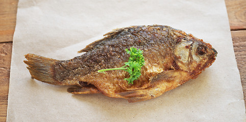 Image showing fried fish on paper