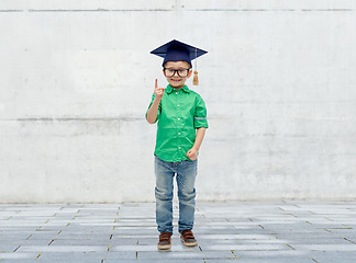 Image showing happy boy in bachelor hat and eyeglasses