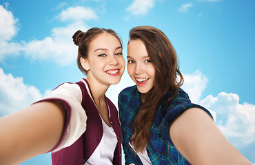 Image showing happy smiling pretty teenage girls taking selfie