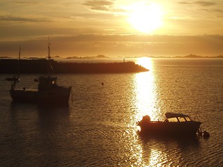 Image showing Boats bathing in the midnightsun at 3 a.m. Lofoten