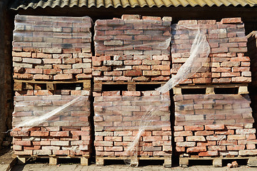 Image showing bricks at the construction site 