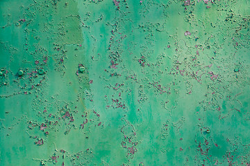 Image showing Old green cracked paint on metal background