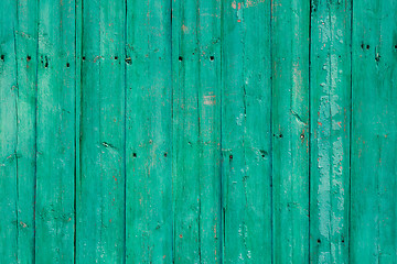 Image showing Old green cracked paint on wooden background