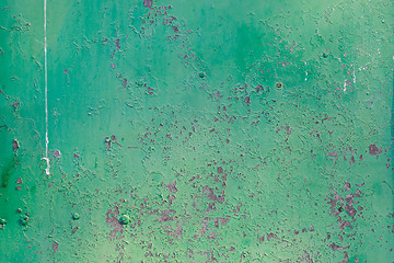 Image showing Old green cracked paint on metal background