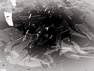 Image showing Shattered and breaking glass on grey with shallow DOF