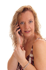 Image showing Happy blond woman on cell phone.