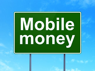 Image showing Currency concept: Mobile Money on road sign background