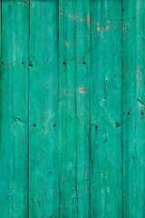 Image showing Old green cracked paint on wooden background