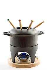 Image showing cast iron fondue set
