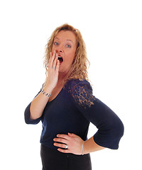 Image showing Surprised blond middle age woman.