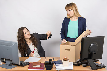 Image showing Office gesture girl humiliates the dismissed colleague