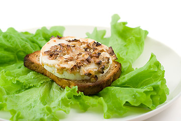 Image showing green salad with goat cheese and toast
