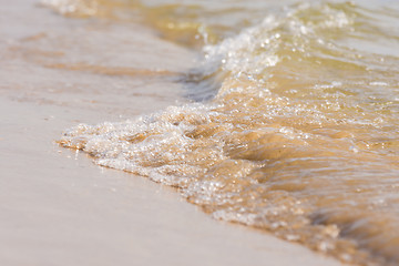 Image showing The wave rolled on the sandy shore