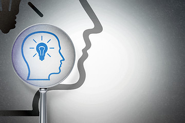 Image showing Data concept:  Head With Lightbulb with optical glass on digital background