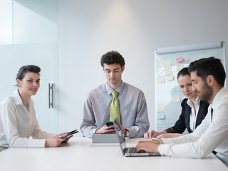 Image showing group of young business people  on meeting at modern startup off