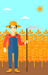 Image showing Farmer on the field with scythe.