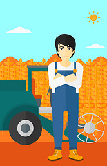 Image showing Man standing with combine on background.