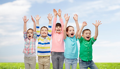 Image showing happy friends celebrating victory