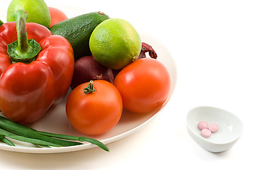 Image showing fresh vegetables against vitimin pill