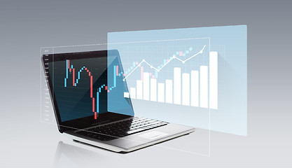 Image showing laptop computer with chart on screen