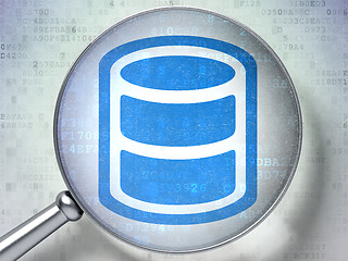 Image showing Database concept: Database with optical glass on digital background