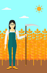 Image showing Farmer on the field with scythe.