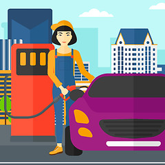 Image showing Woman filling up fuel into car.