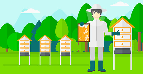 Image showing Bee-keeper at apiary.